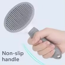 self cleaning pet brush — in use with pet